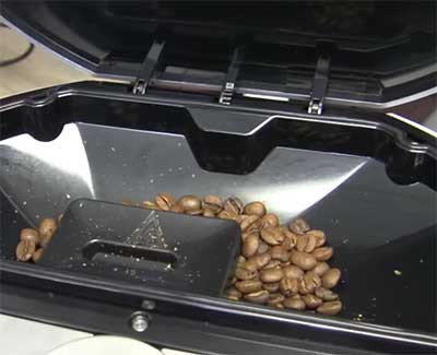 An image of Krups EA9010's 8.8-ounce bean hopper