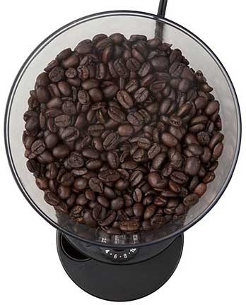 An image of ​Mr. Coffee BMH23 burr grinder filled with coffee beans