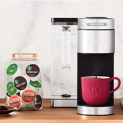 Coffee pods in a clear jar and Keurig Supreme