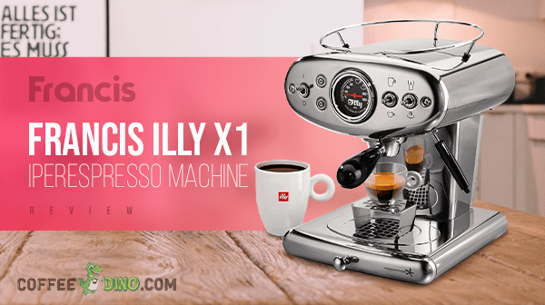A chrome Francis Francis Illy X1 Iperespresso Machine and a cup of coffee on a wooden table